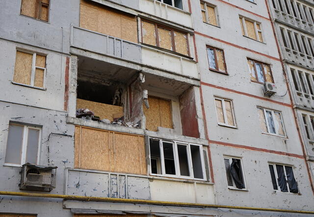 Windows of a residential building in Kharkiv heavily damaged by bombing.